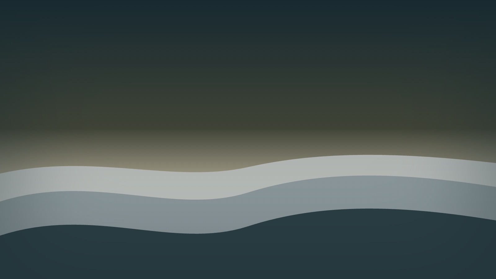 Layered distant hills fading into gentle morning haze under a calm sky.